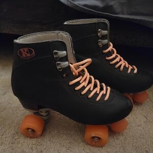 Black and Orange Roller Skates